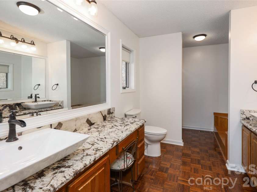 682 Cecil Street, Thomasville, NC 27360.  MLS# CAR4411361, YatesRealty ID 9827. Primary bath with dual vanities