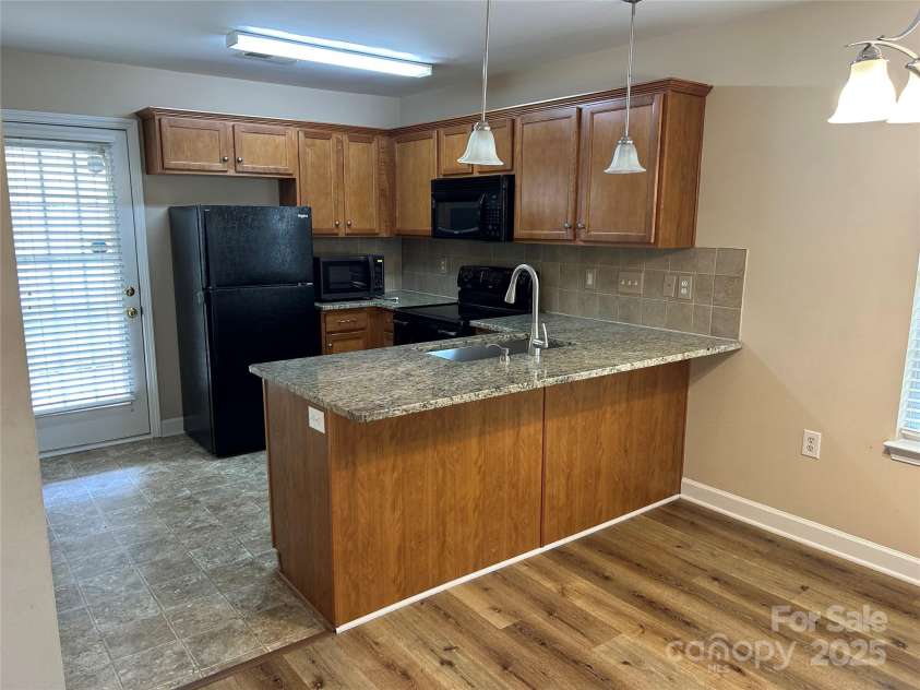 1156 Fowler Brook Court, Indian Land, SC 29707.  MLS# CAR4249120, YatesRealty ID 9834. Kitchen/Dining