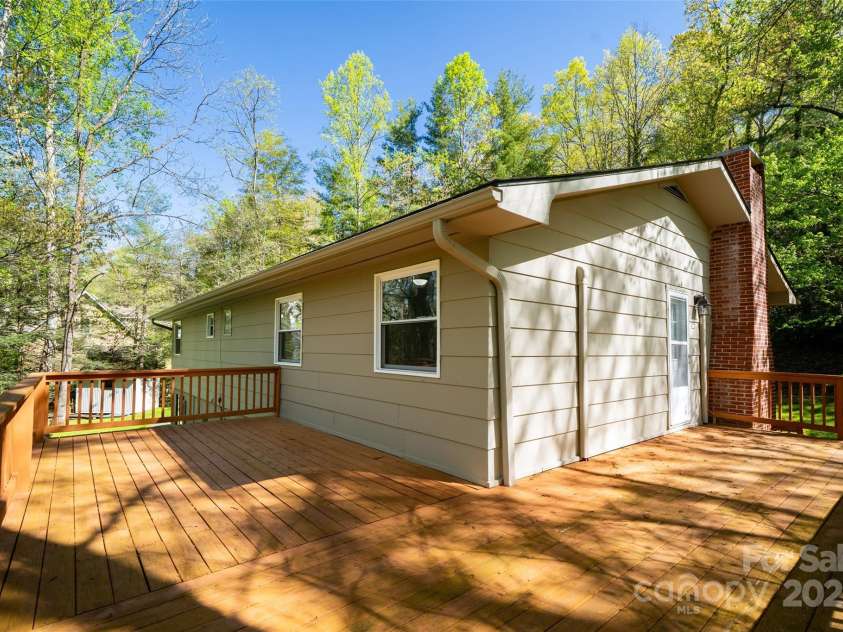 145 Jeter Mountain Road, Hendersonville, NC 28739.  MLS# CAR4281389, YatesRealty ID 984. 3 Levels of decking to enjoy the outside