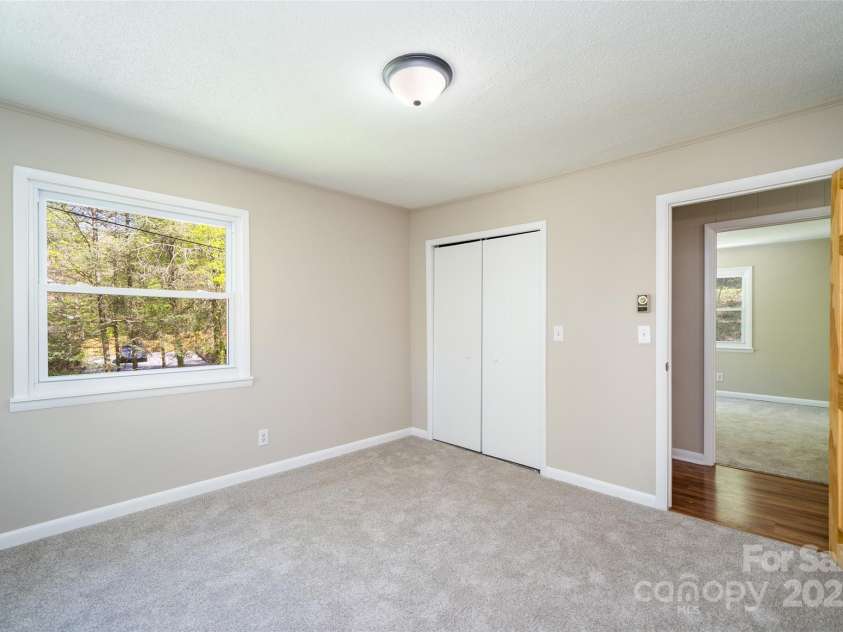 145 Jeter Mountain Road, Hendersonville, NC 28739.  MLS# CAR4281389, YatesRealty ID 984. 4th Bedroom 11.8 X 12