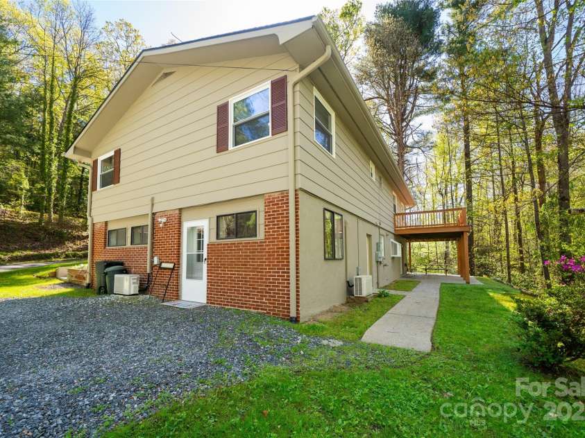 145 Jeter Mountain Road, Hendersonville, NC 28739.  MLS# CAR4281389, YatesRealty ID 984. Drive up, no stairs to enter the lower level