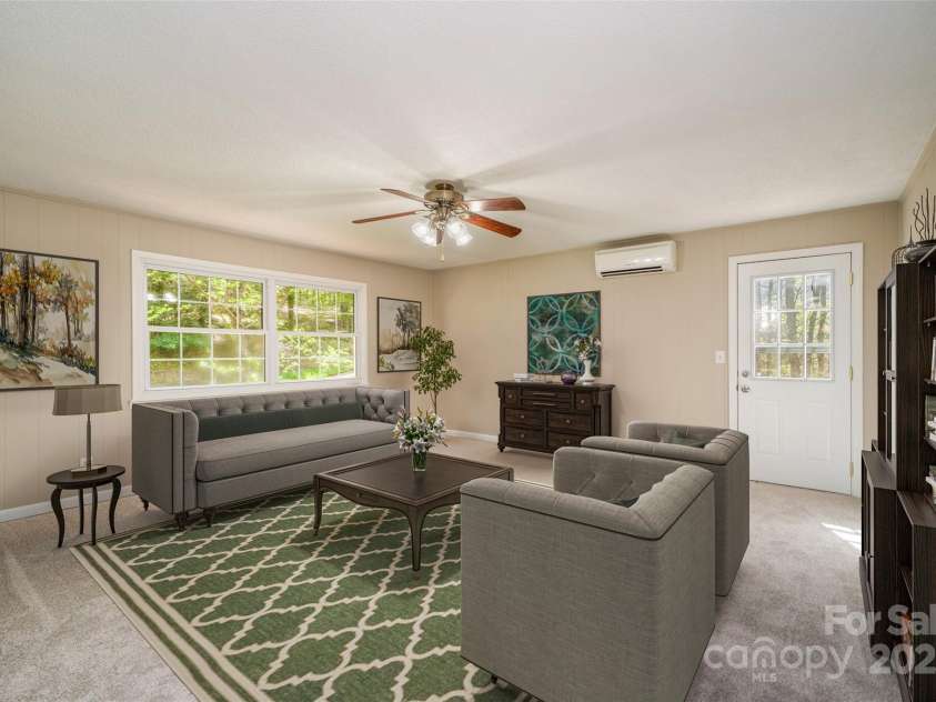 145 Jeter Mountain Road, Hendersonville, NC 28739.  MLS# CAR4281389, YatesRealty ID 984. Staged. Formal living room