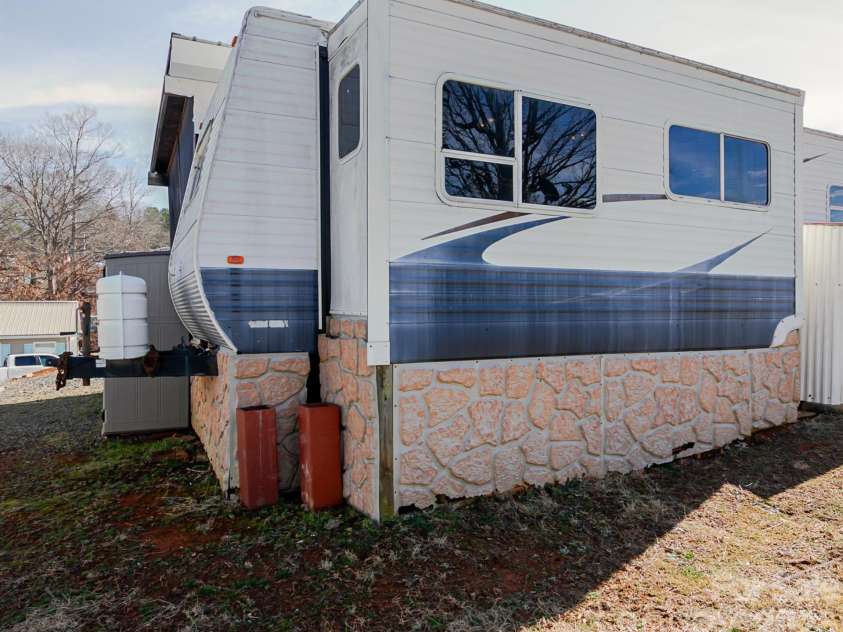 166 Badin Lake Circle, New London, NC 28127.  MLS# CAR4344740, YatesRealty ID 9841. 