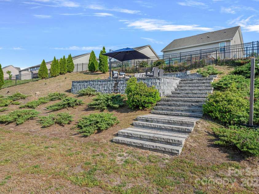 7332 Newsome Court, Concord, NC 28025.  MLS# CAR4253891, YatesRealty ID 9841. Upper Level Patio