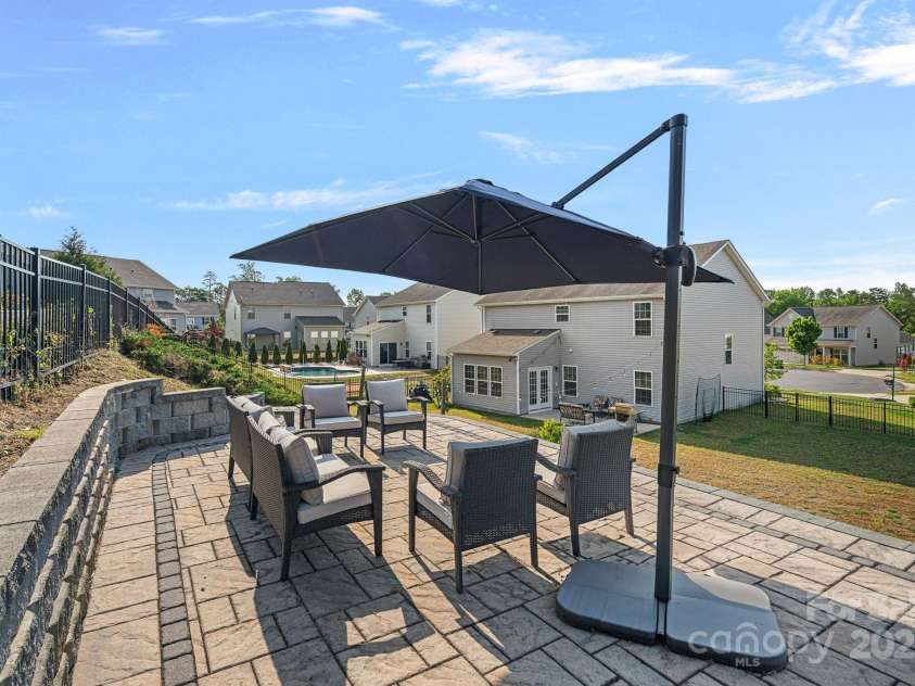 7332 Newsome Court, Concord, NC 28025.  MLS# CAR4253891, YatesRealty ID 9841. Upper Level Patio Overlooking the Backyard