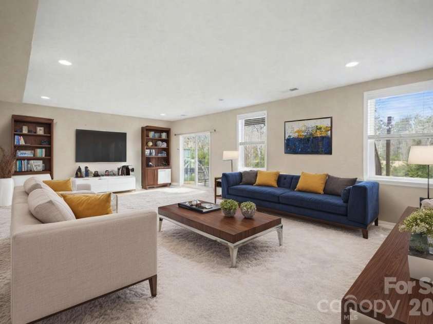 7200 Irongate Drive, Lancaster, SC 29720.  MLS# CAR4341310, YatesRealty ID 9842. Basement living room - virtually staged