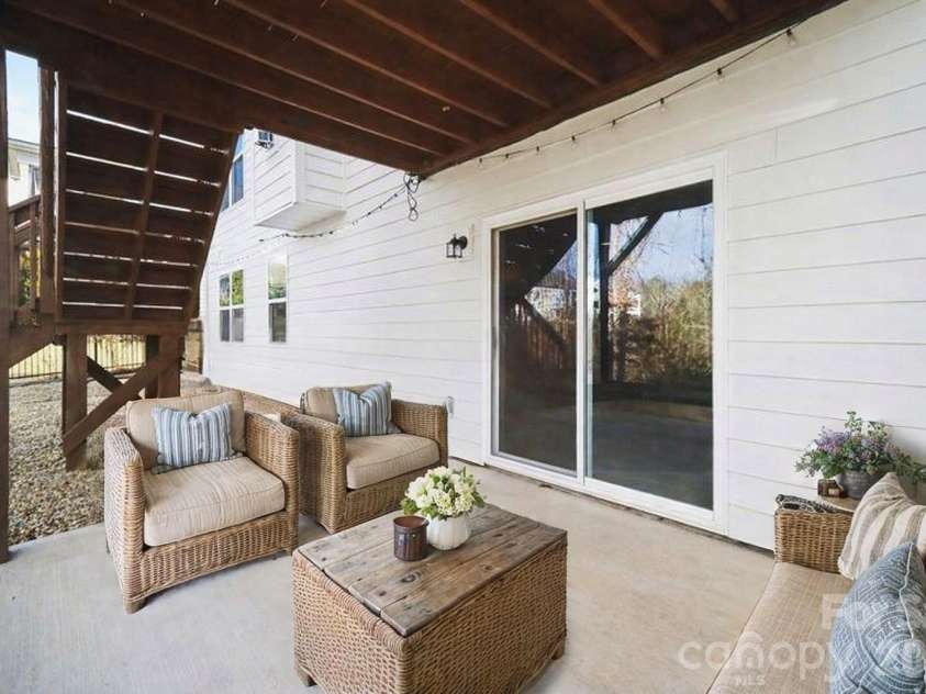7200 Irongate Drive, Lancaster, SC 29720.  MLS# CAR4341310, YatesRealty ID 9842. Covered Patio - Virtually Staged