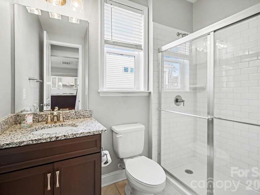 7200 Irongate Drive, Lancaster, SC 29720.  MLS# CAR4341310, YatesRealty ID 9842. Guest Suite - Main Level Bathroom 1