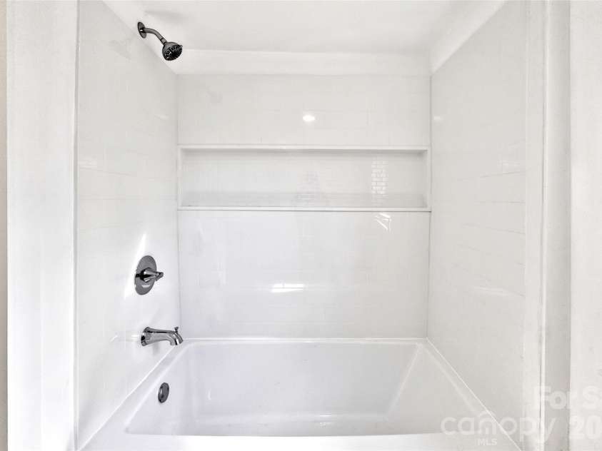 90 Ebenezer Road, Old Fort, NC 28762.  MLS# CAR4351038, YatesRealty ID 9846. Bathroom #2 new bathtub /shower combo 