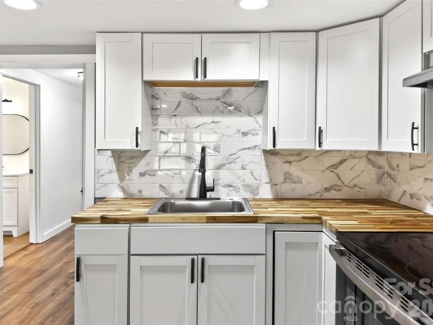 90 Ebenezer Road, Old Fort, NC 28762.  MLS# CAR4351038, YatesRealty ID 9846. Kitchen sink view 