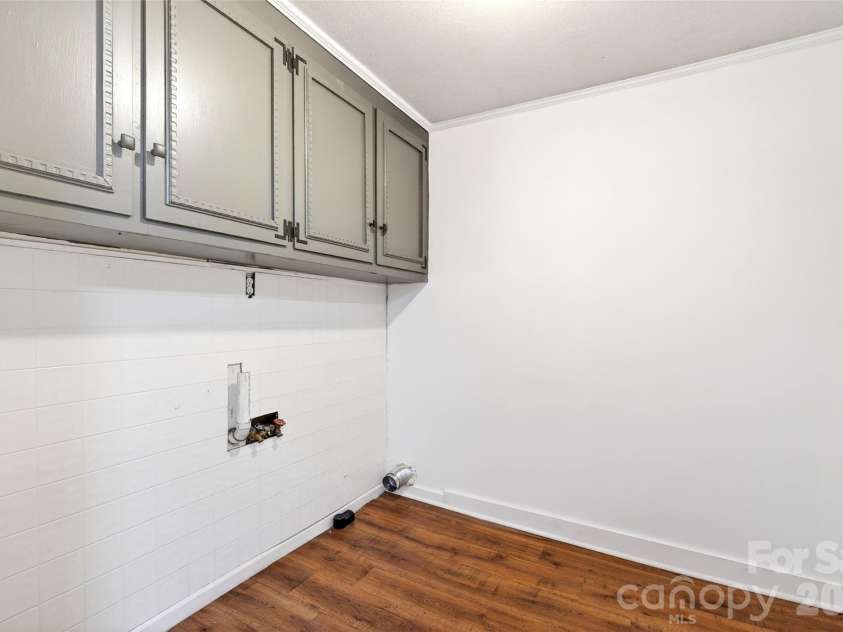 90 Ebenezer Road, Old Fort, NC 28762.  MLS# CAR4351038, YatesRealty ID 9846. Laundry room 
