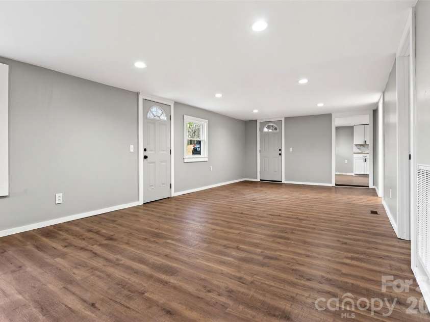 90 Ebenezer Road, Old Fort, NC 28762.  MLS# CAR4351038, YatesRealty ID 9846. Livingroom front door view 