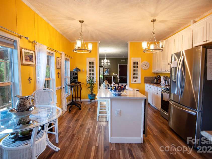 304 Golden Aster Road, Swannanoa, NC 28778.  MLS# CAR4304564, YatesRealty ID 985. Dining area and kitchen 