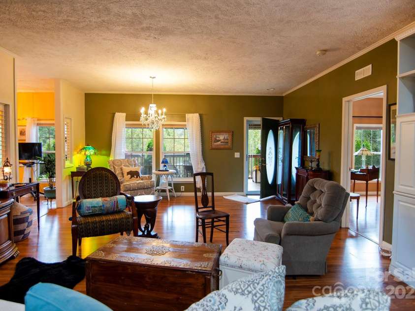 304 Golden Aster Road, Swannanoa, NC 28778.  MLS# CAR4304564, YatesRealty ID 985. Open Concept Living room sitting area combo
