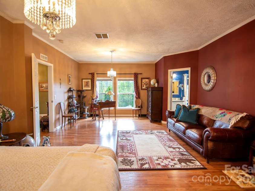 304 Golden Aster Road, Swannanoa, NC 28778.  MLS# CAR4304564, YatesRealty ID 985. Spacious Primary Bedroom