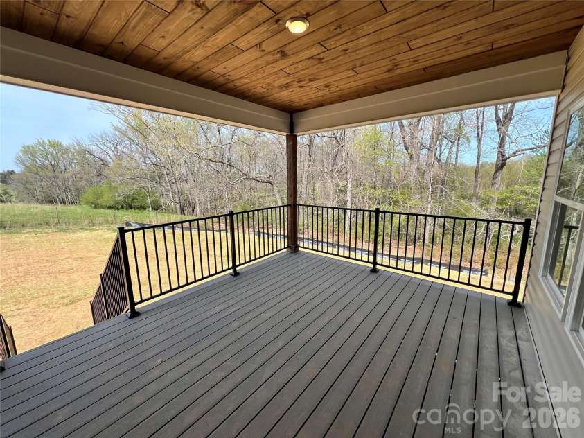 42629 Greenview Drive, Albemarle, NC 28001.  MLS# CAR4362903, YatesRealty ID 9853. Rear Covered Porch with great views