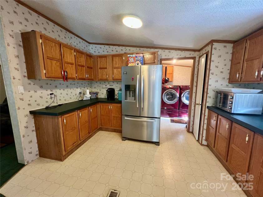 343 Daytona Lane, Saluda, NC 28773.  MLS# CAR4253857, YatesRealty ID 9858. Amble Cabinet Storage