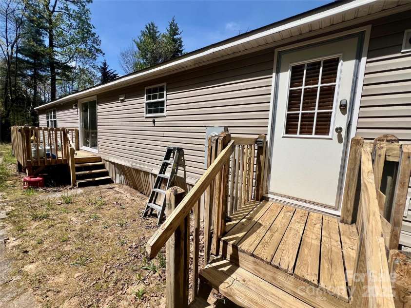 343 Daytona Lane, Saluda, NC 28773.  MLS# CAR4253857, YatesRealty ID 9858. Back of Home