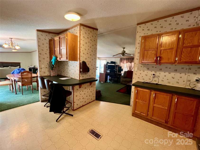 343 Daytona Lane, Saluda, NC 28773.  MLS# CAR4253857, YatesRealty ID 9858. Breakfast Bar in Kitchen