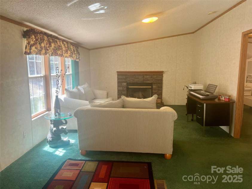 343 Daytona Lane, Saluda, NC 28773.  MLS# CAR4253857, YatesRealty ID 9858. Den