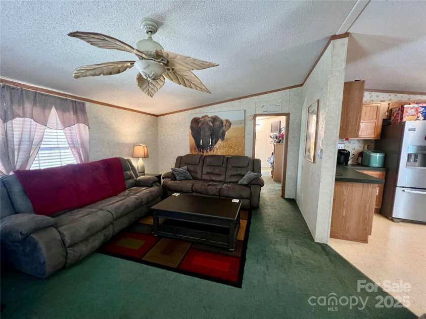 343 Daytona Lane, Saluda, NC 28773.  MLS# CAR4253857, YatesRealty ID 9858. Living Room