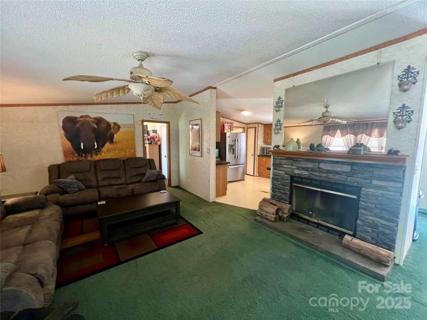 343 Daytona Lane, Saluda, NC 28773.  MLS# CAR4253857, YatesRealty ID 9858. Living Room