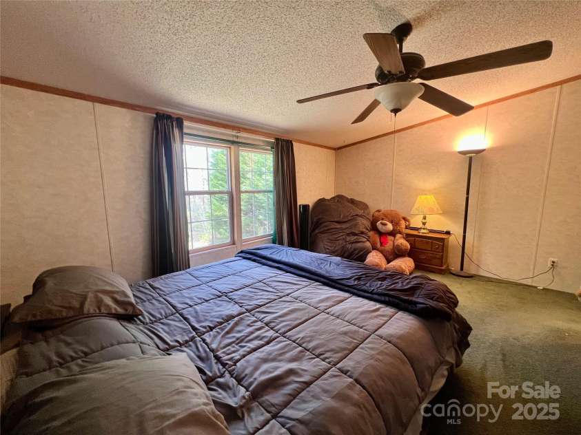343 Daytona Lane, Saluda, NC 28773.  MLS# CAR4253857, YatesRealty ID 9858. Primary Bedroom