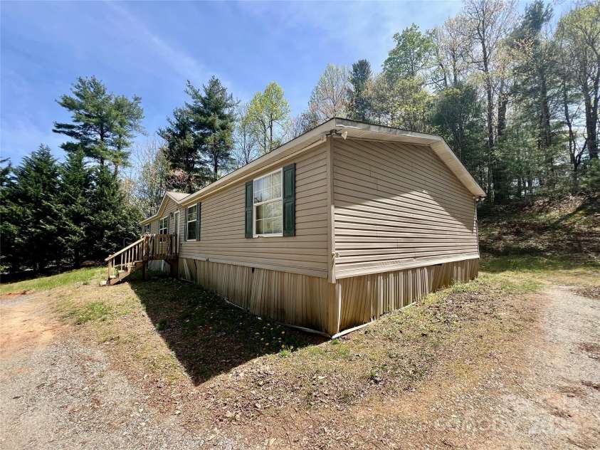 343 Daytona Lane, Saluda, NC 28773.  MLS# CAR4253857, YatesRealty ID 9858. Side View of Home