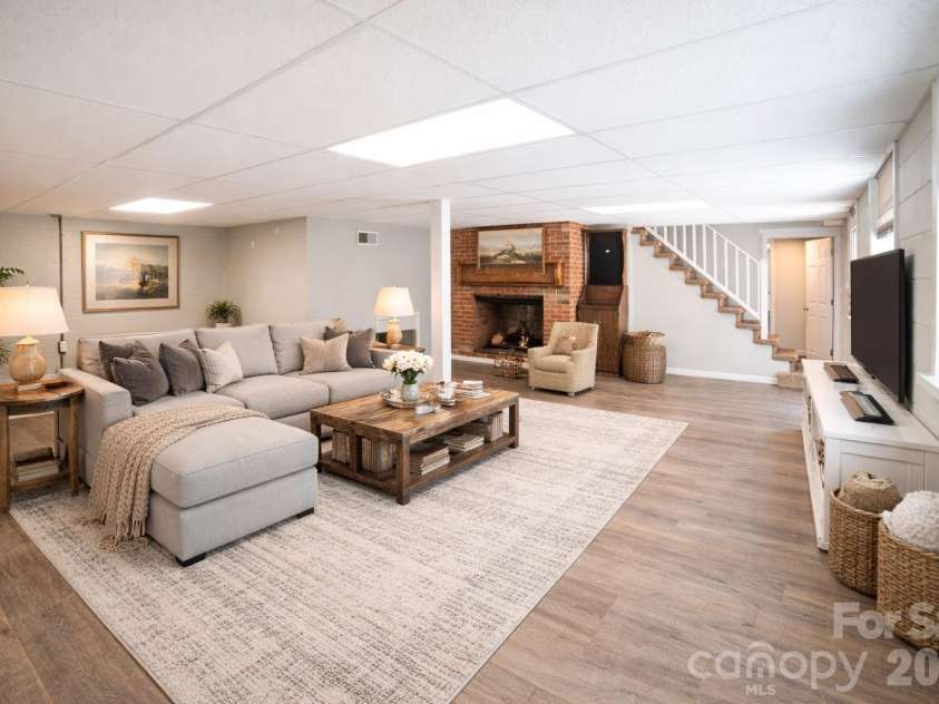 414 Patton Street, Morganton, NC 28655.  MLS# CAR4367437, YatesRealty ID 9859. Basement Great Room - Virtually Staged