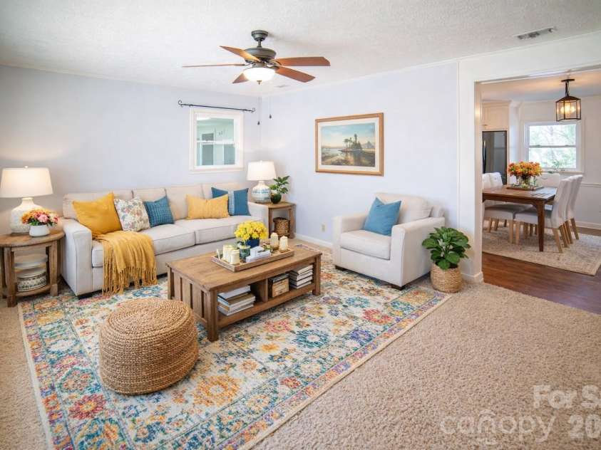 414 Patton Street, Morganton, NC 28655.  MLS# CAR4367437, YatesRealty ID 9859. Living Room looking into Dining Area - Virtually Staged