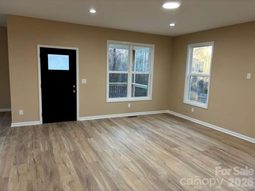 98 Brooklyn Road, Asheville, NC 28803.  MLS# CAR4330787, YatesRealty ID 9860. Custom lighting with natural light from numerous windows.