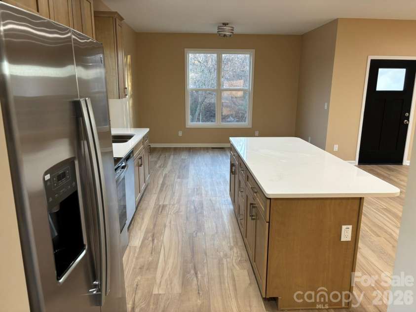 98 Brooklyn Road, Asheville, NC 28803.  MLS# CAR4330787, YatesRealty ID 9860. Mud room/side entrance makes kitchen access so easy!