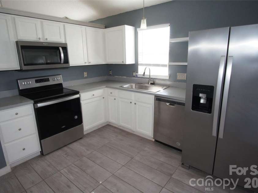 8913 Cinnabay Drive, Charlotte, NC 28216.  MLS# CAR4345850, YatesRealty ID 9862. 