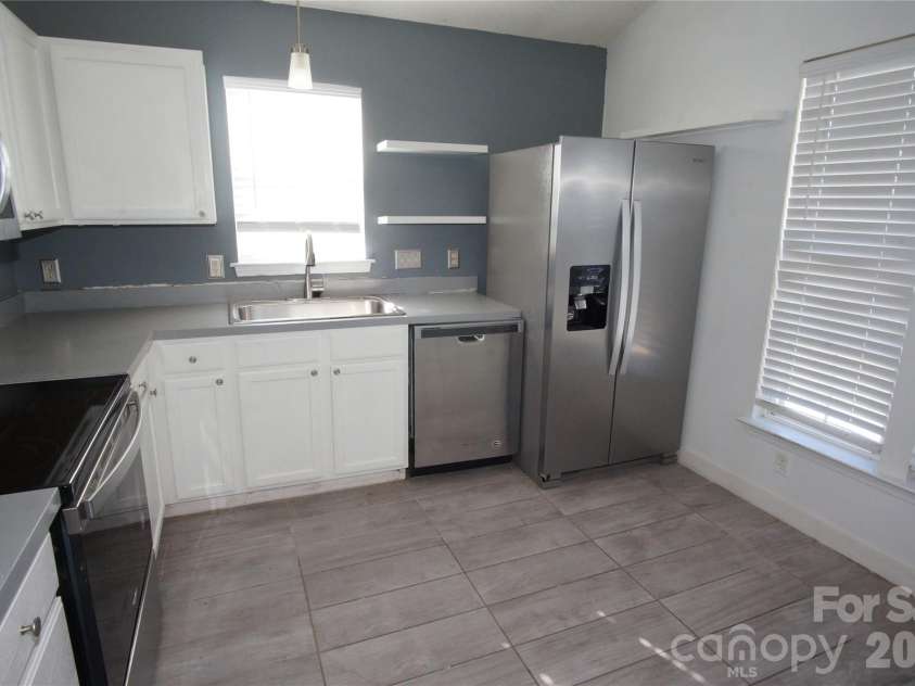 8913 Cinnabay Drive, Charlotte, NC 28216.  MLS# CAR4345850, YatesRealty ID 9862. 