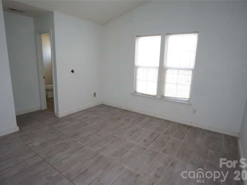 8913 Cinnabay Drive, Charlotte, NC 28216.  MLS# CAR4345850, YatesRealty ID 9862. 