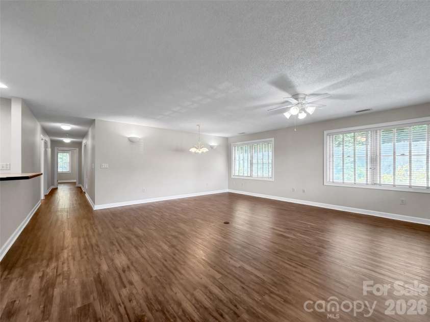 1465 Lakeshore Drive, Lake Junaluska, NC 28745.  MLS# CAR4294485, YatesRealty ID 9863. Great Room with New Flooring