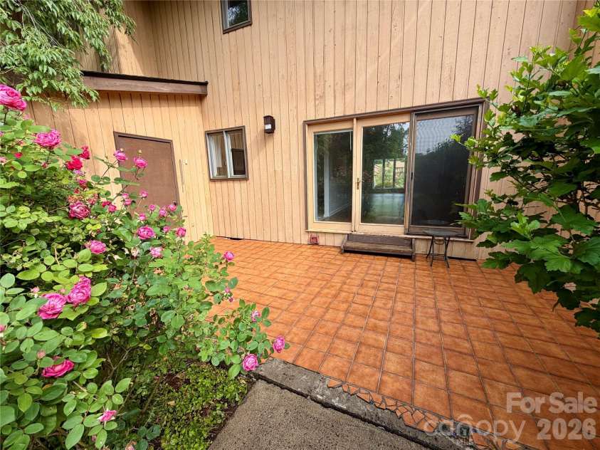 103 Pebble Creek Drive, Asheville, NC 28803.  MLS# CAR4328597, YatesRealty ID 9874. Back patio