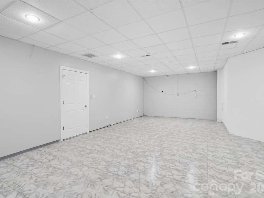 2812 Woodwind Court, Kannapolis, NC 28081.  MLS# CAR4341177, YatesRealty ID 9875. Basement Flex-Room