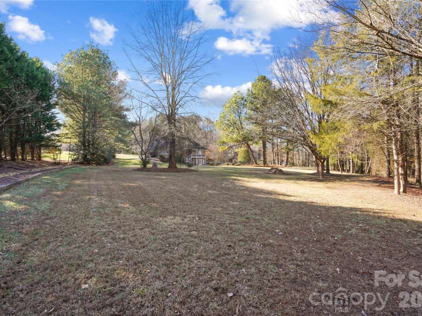 2812 Woodwind Court, Kannapolis, NC 28081.  MLS# CAR4341177, YatesRealty ID 9875. Spacious Back Yard