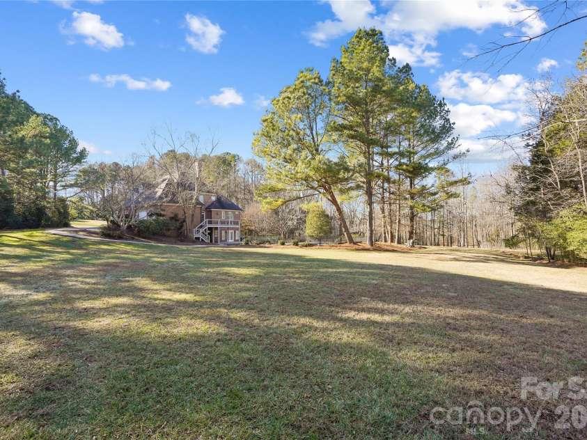 2812 Woodwind Court, Kannapolis, NC 28081.  MLS# CAR4341177, YatesRealty ID 9875. Spacious Back Yard