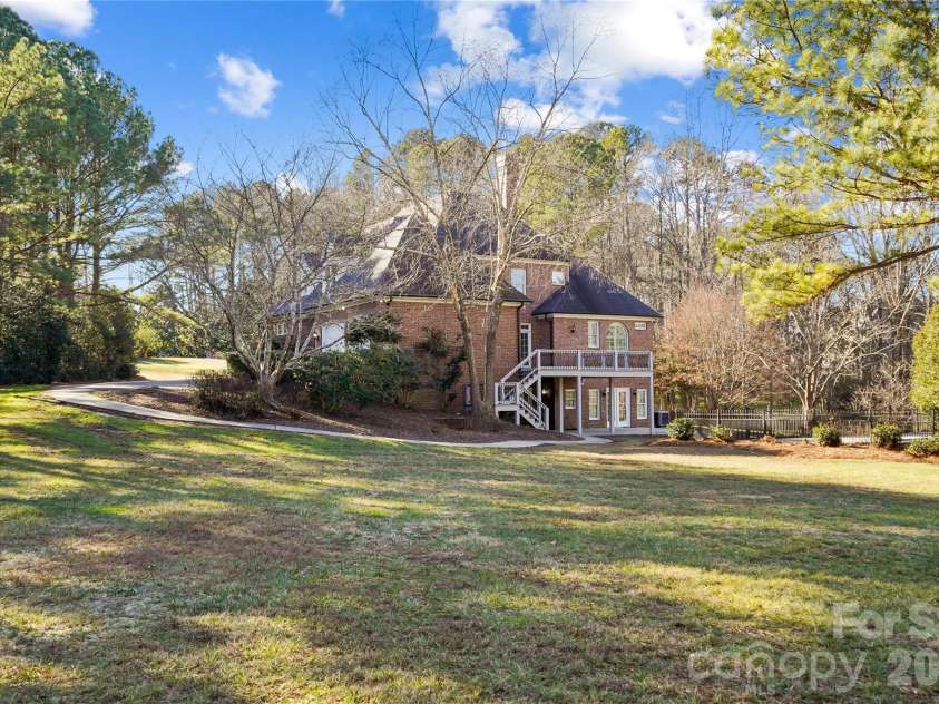 2812 Woodwind Court, Kannapolis, NC 28081.  MLS# CAR4341177, YatesRealty ID 9875. Spacious Back Yard