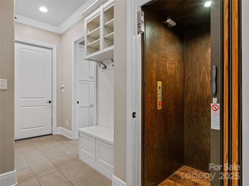 5 Cleftridge Court, Asheville, NC 28803.  MLS# CAR4244446, YatesRealty ID 9879. Elevator