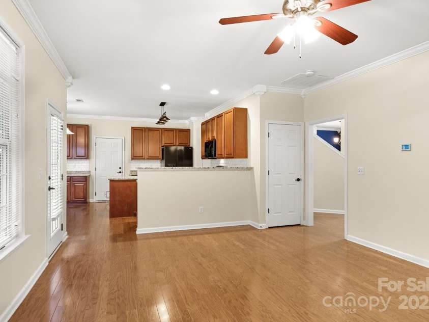 8 River Mead Court, Woodfin, NC 28804.  MLS# CAR4314476, YatesRealty ID 9879. Den looking into Kitchen