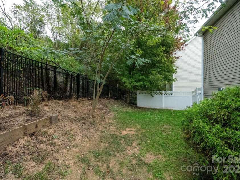 8 River Mead Court, Woodfin, NC 28804.  MLS# CAR4314476, YatesRealty ID 9879. Fenced Backyard