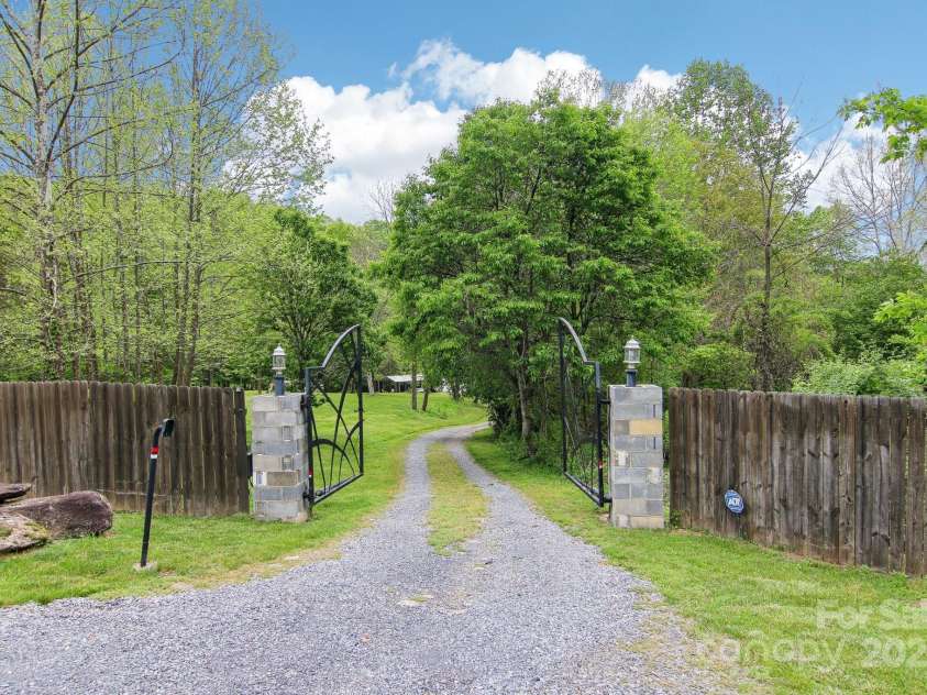 165 Sequoyah Drive, Waynesville, NC 28785.  MLS# CAR4249875, YatesRealty ID 9884. Convenient parking with both a carport and large driveway