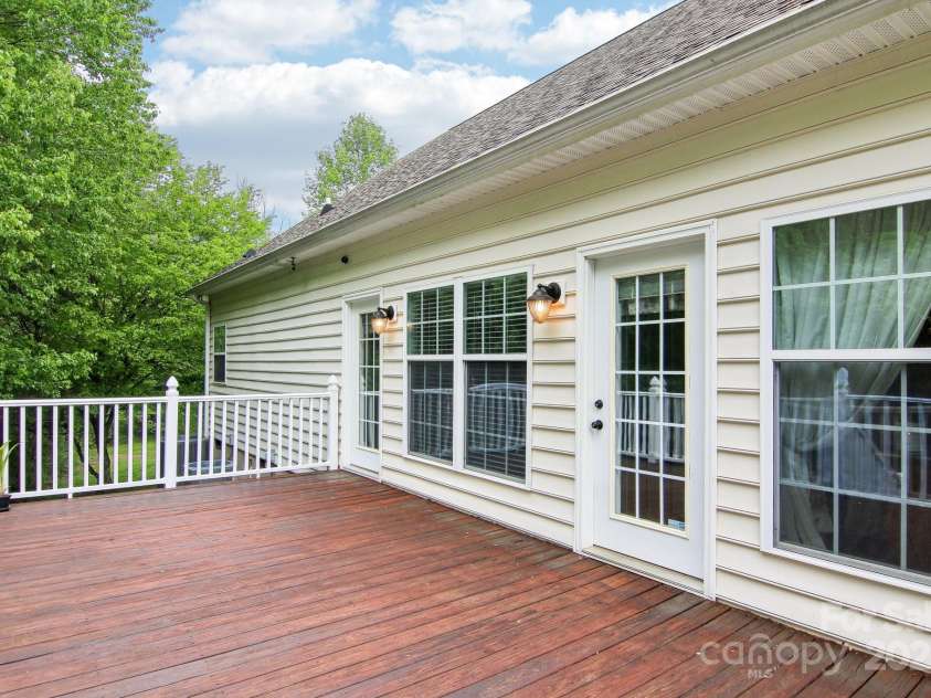 165 Sequoyah Drive, Waynesville, NC 28785.  MLS# CAR4249875, YatesRealty ID 9884. Generous deck is perfect for grilling or taking in views of the great outdoors