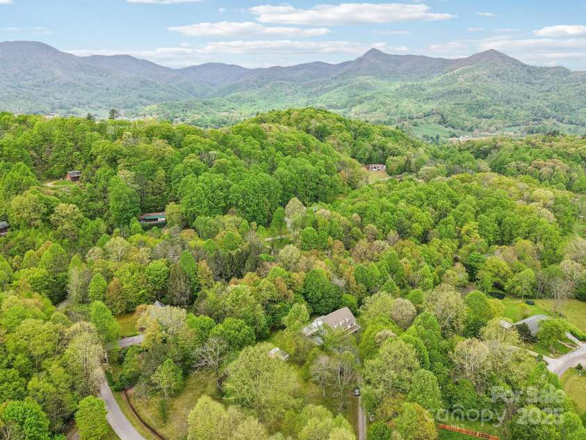 165 Sequoyah Drive, Waynesville, NC 28785.  MLS# CAR4249875, YatesRealty ID 9884. Private, easy-access location just 2.5 miles from I-40 in a desirable community