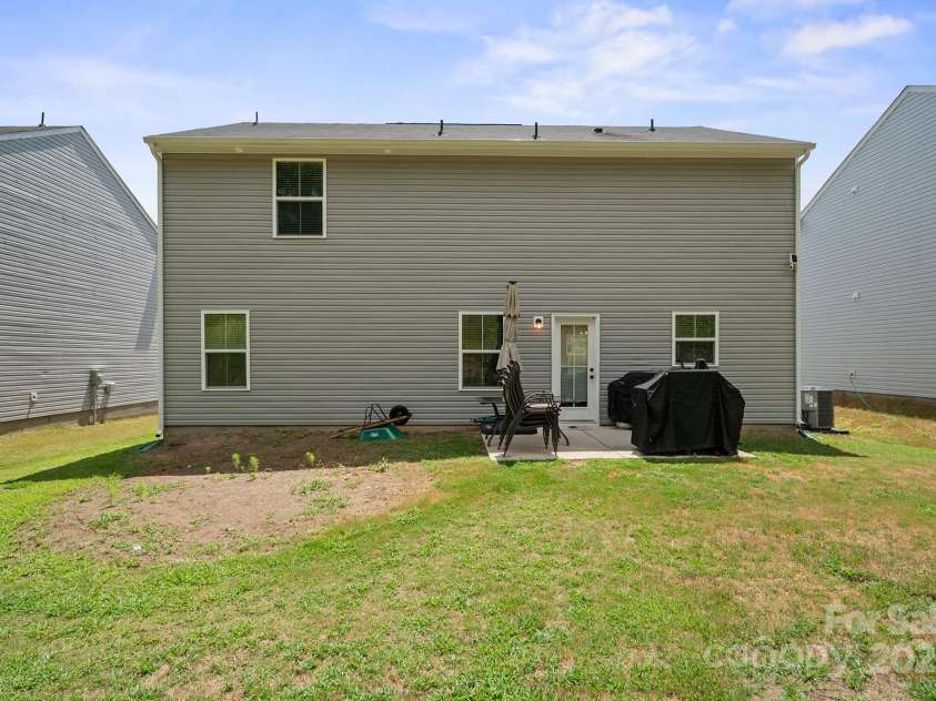 707 Pointe Andrews Drive, Concord, NC 28025.  MLS# CAR4280362, YatesRealty ID 9895. Backyard