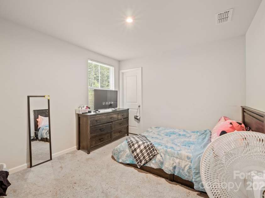 707 Pointe Andrews Drive, Concord, NC 28025.  MLS# CAR4280362, YatesRealty ID 9895. Bedroom 4