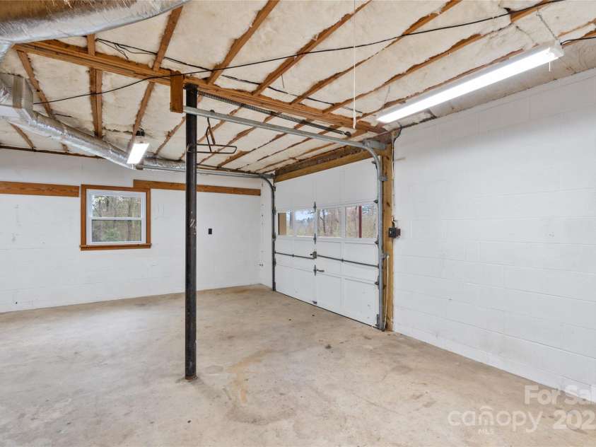 25 Pisgah Shadows Way, Hendersonville, NC 28739.  MLS# CAR4206550, YatesRealty ID 9897. Garage
